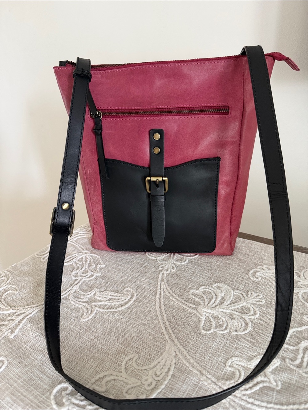 Nino Bassi Two-Tone Pink & Black Leather Crossbody Bag with Front Buckle Detail